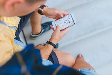 man looking at phone